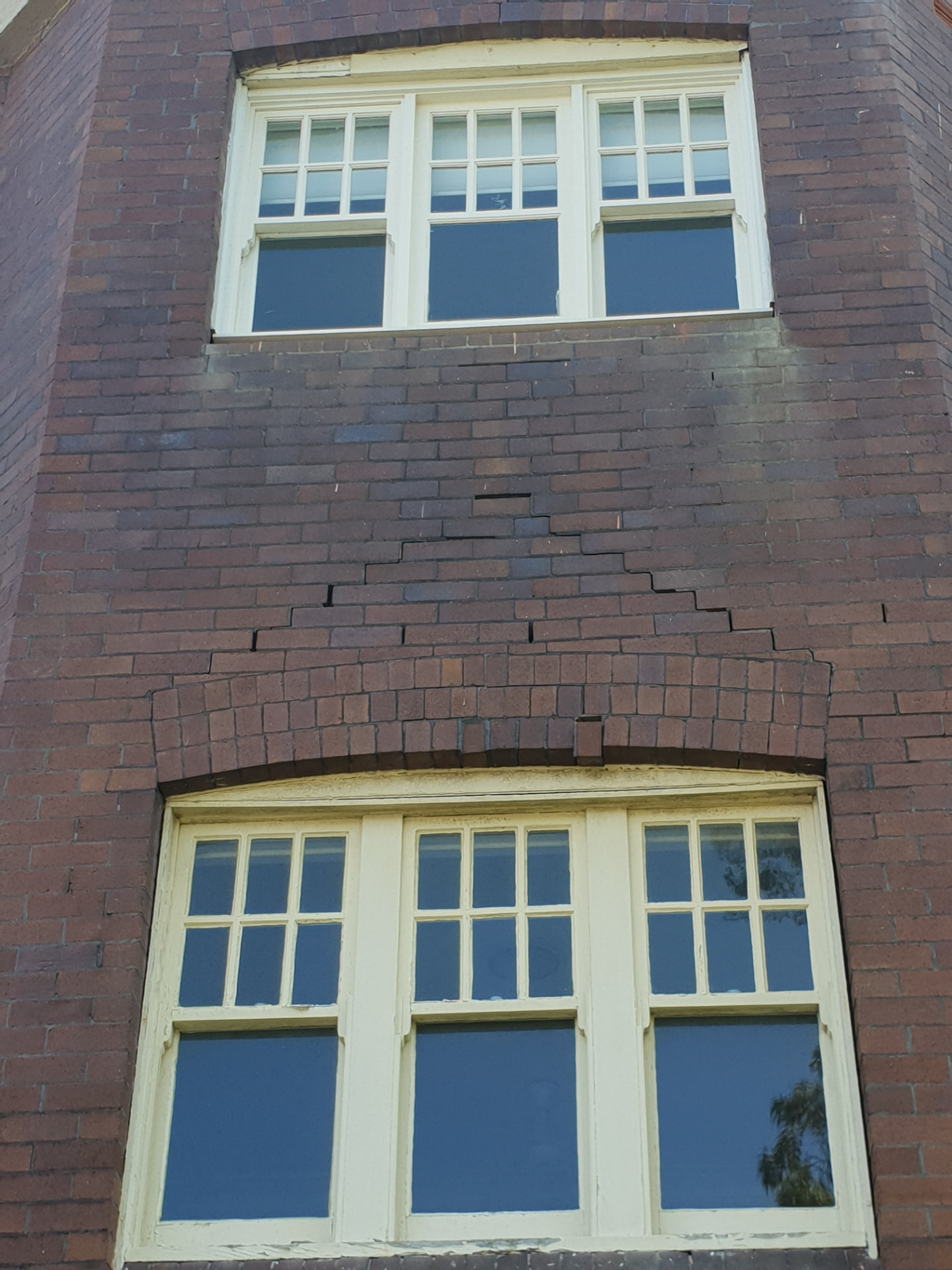 Stepped cracking running through brickwork before repair