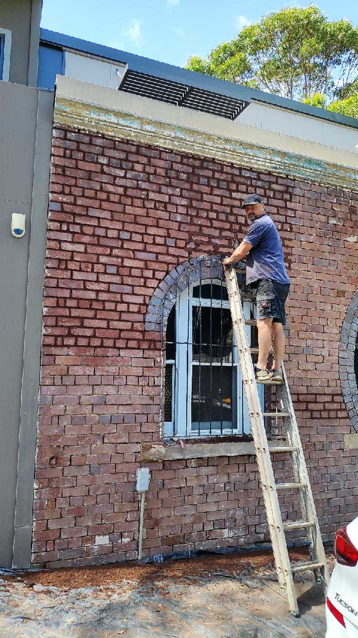 Repointing and brick repairs in progress
